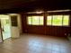 Spacious living room with access to the bathroom featuring tiled flooring at 472 Rosalia Dr, Sanford, FL 32771