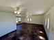 Large living room showcasing ceiling fans and double doors, creating a bright and inviting space at 472 Rosalia Dr, Sanford, FL 32771