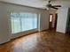 Bright living room boasting hardwood floors, large windows, and plenty of natural light at 472 Rosalia Dr, Sanford, FL 32771