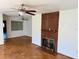 Spacious living room with hardwood floors and a brick fireplace at 472 Rosalia Dr, Sanford, FL 32771