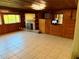 Inviting living room featuring a fireplace, built-in storage, and tile flooring at 472 Rosalia Dr, Sanford, FL 32771