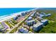 Stunning aerial view of beach condos, offering beautiful oceanfront living and resort-style amenities at 5300 S Atlantic Ave # 7-301, New Smyrna Beach, FL 32169