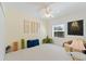 Serene bedroom with ample space and natural light, ideal for yoga or meditation at 5300 S Atlantic Ave # 7-301, New Smyrna Beach, FL 32169