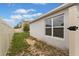 Sideyard with a fence and a view of the neighboring house at 600 Bullrush Ct, Davenport, FL 33837