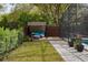 Backyard view showing a screened pool area and pergola providing an ideal outdoor relaxation space at 6339 Coopers Green Ct, Orlando, FL 32819