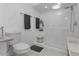Bright bathroom with a tiled shower, modern fixtures, and ample counter space at 6339 Coopers Green Ct, Orlando, FL 32819