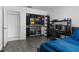 Bedroom with modern workstation, walk-in closet with custom storage solutions at 6339 Coopers Green Ct, Orlando, FL 32819