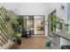 Charming outdoor patio featuring a lattice wall with plants and comfortable seating at 6339 Coopers Green Ct, Orlando, FL 32819