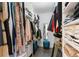 Walk-in closet with custom shelving and storage space, featuring an organization system at 6339 Coopers Green Ct, Orlando, FL 32819