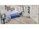 Cozy bedroom featuring wood floors, fan and ample space for a desk at 7781 Sugar Bend Dr # 7781, Orlando, FL 32819