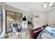 Bedroom with a reading area and a sliding glass door at 7781 Sugar Bend Dr # 7781, Orlando, FL 32819