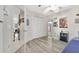 View of the bedroom featuring a large window, wood floors and ample space at 7781 Sugar Bend Dr # 7781, Orlando, FL 32819