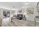 Inviting living room with a screened porch area, modern decor, and a comfortable seating arrangement at 7781 Sugar Bend Dr # 7781, Orlando, FL 32819