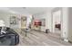 Bright living room featuring sleek wood floors and neutral color palette at 7781 Sugar Bend Dr # 7781, Orlando, FL 32819