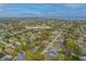 Aerial view of property at 818 Alabama Ave in a lush, green neighborhood at 818 Alabama Ave, St Cloud, FL 34769