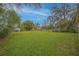 Spacious, grassy backyard offers plenty of room for outdoor activities and relaxation at 818 Alabama Ave, St Cloud, FL 34769