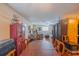 Spacious living and dining area featuring hardwood floors and ample natural light at 818 Alabama Ave, St Cloud, FL 34769