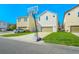 Two-story home boasts a well-manicured lawn, and a basketball hoop in the driveway at 8321 Bryce Canyon Ave, Windermere, FL 34786