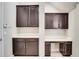 Office space with dark cabinets, white countertops, desk, and overhead storage at 8321 Bryce Canyon Ave, Windermere, FL 34786
