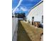 Backyard view with privacy fence and space for outdoor activities and relaxation at 8630 Knottingham Dr, Kissimmee, FL 34747