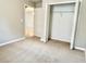 Carpeted bedroom featuring a closet at 8923 Azalea Sands Ln, Davenport, FL 33896