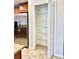 A walk-in pantry with ample shelving, adjacent to the kitchen at 8923 Azalea Sands Ln, Davenport, FL 33896