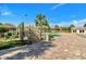 Recreational area featuring a bridge to a large pool with lounge chairs at 8923 Azalea Sands Ln, Davenport, FL 33896