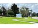 Community sign for Oasis Clubhouse in landscaped setting at 8923 Azalea Sands Ln, Davenport, FL 33896