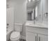 Clean bathroom featuring a modern vanity, toilet, and a tiled shower with glass door at 8960 Se 88Th Pl, Ocala, FL 34472