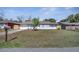 Charming single-story home featuring a well-maintained lawn and a welcoming front entrance at 8960 Se 88Th Pl, Ocala, FL 34472
