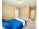 Neutral bedroom with carpet and a full bed, features ensuite bath and closet at 9207 Busaco Park Way, Winter Garden, FL 34787