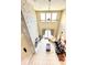Bright living room boasts a stone fireplace, high ceilings, and an open layout perfect for entertaining at 9207 Busaco Park Way, Winter Garden, FL 34787