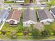 Aerial view displays the neatly kept backyard and landscaping of the home at 958 High Point Loop, Longwood, FL 32750