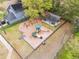 Aerial view of a community playground with slides, swings, and covered picnic area at 958 High Point Loop, Longwood, FL 32750