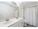Bathroom featuring double sinks and a shower over the tub at 958 High Point Loop, Longwood, FL 32750