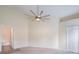 Bright bedroom with neutral carpet, ceiling fan, and closet at 958 High Point Loop, Longwood, FL 32750