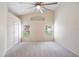 Light, bright bedroom with vaulted ceiling, carpet, and windows overlooking landscaped yard at 958 High Point Loop, Longwood, FL 32750
