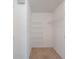 Walk-in closet with multiple shelves and plenty of storage space at 958 High Point Loop, Longwood, FL 32750