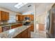 Modern kitchen with granite countertops, stainless steel appliances and adjoining eating area at 958 High Point Loop, Longwood, FL 32750