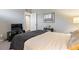 Modern bedroom with neutral walls and TV at 974 E Michigan St # 974, Orlando, FL 32806