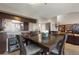 Dining room features a table, chairs, and a view into the kitchen at 974 E Michigan St # 974, Orlando, FL 32806