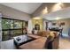 View of open floor plan living room and dining area with access to a patio at 974 E Michigan St # 974, Orlando, FL 32806
