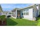 Spacious backyard features a screened-in porch and well-maintained green lawn at 985 Huntspoint St, Winter Garden, FL 34787