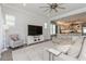 Bright living room featuring an open floor plan and luxury vinyl plank flooring at 985 Huntspoint St, Winter Garden, FL 34787