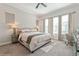 Sunlit main bedroom featuring neutral tones, carpet floors and ample natural light at 985 Huntspoint St, Winter Garden, FL 34787