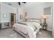 Cozy bedroom with plush carpet and a view leading into the luxurious ensuite bathroom at 985 Huntspoint St, Winter Garden, FL 34787
