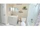 Bright full bathroom with tub/shower, sink, and modern fixtures at 1001 Lester Ridge Ct, Kissimmee, FL 34747