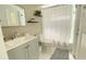 Full bathroom with shower, vanity, toilet, decor, and neutral color palette at 1001 Lester Ridge Ct, Kissimmee, FL 34747