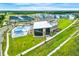 Aerial view of community center with outdoor pool, playground, and modern architectural design at 1018 Stetson St, Orlando, FL 32804