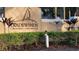 Tradewinds, a MetroWest Condominium, displayed on a stone sign surrounded by manicured landscaping at 1021 S Hiawassee Rd # 3922, Orlando, FL 32835